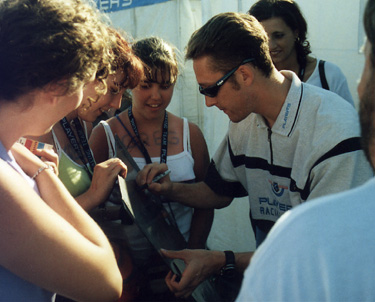 Gregsigning a piece of his car for me