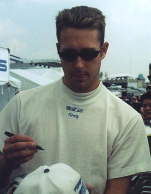 Greg signing autographs