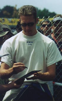 Greg signing autographs