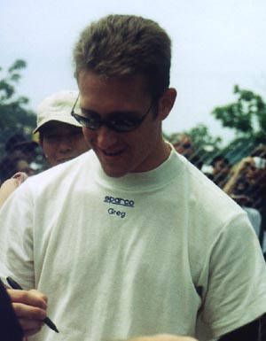 Greg signing autographs