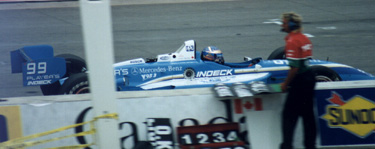 Greg racing in the Indy
